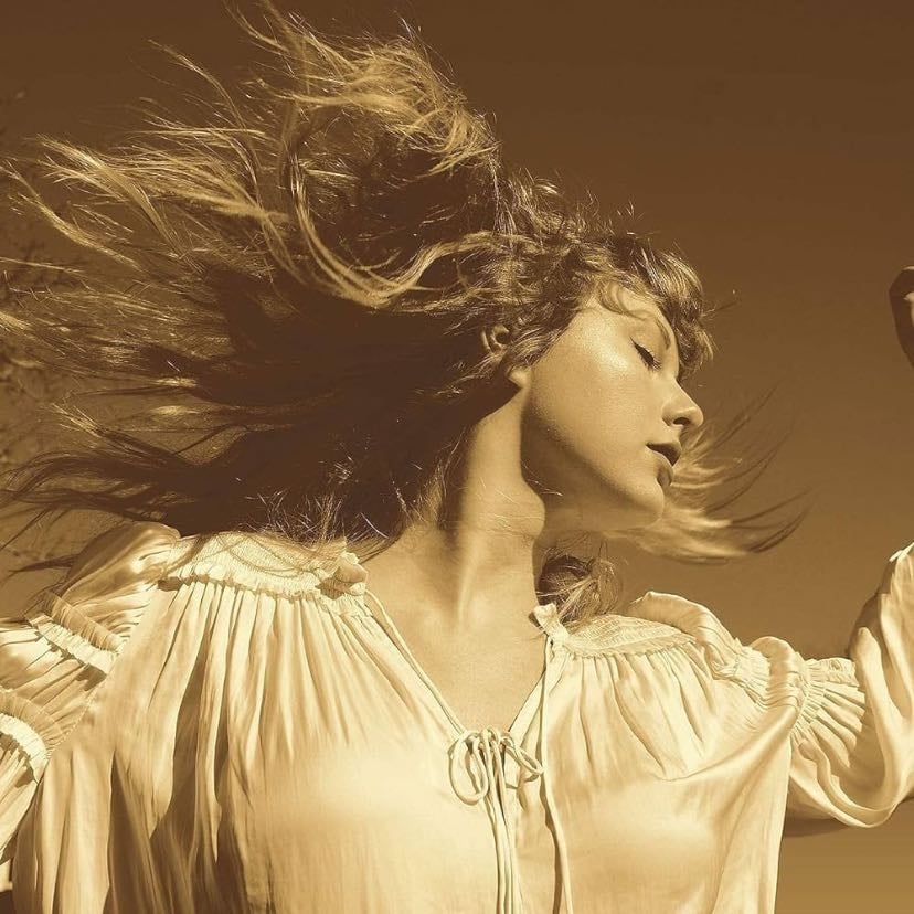 fearless - and i don’t know why but with you i’d dance in a storm in my best dress fearless