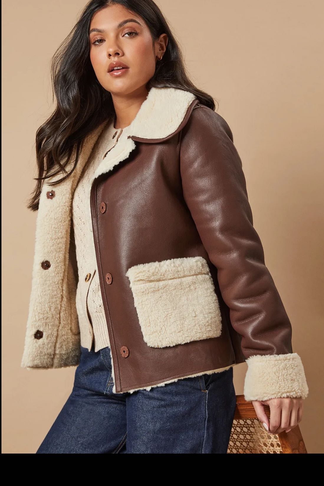 Brown bomber jacket - https://www.debenhams.com/product/oasis-chocolate-shearling-lined-short-aviator-jacket_baa10517