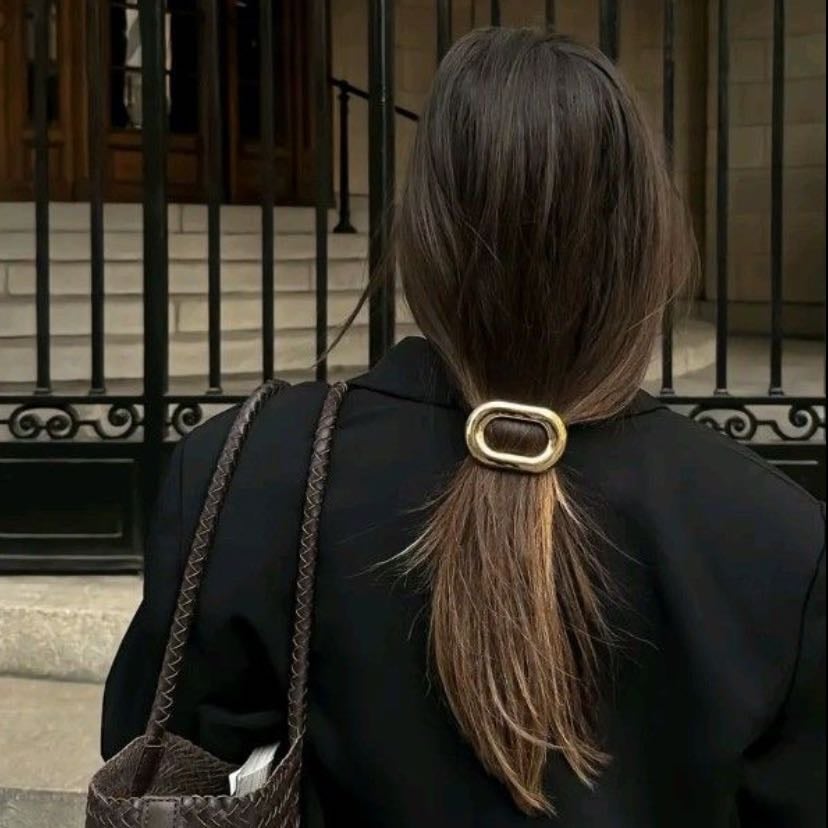 interesting hair accessories - like a shell claw clip or metal hair cuffs