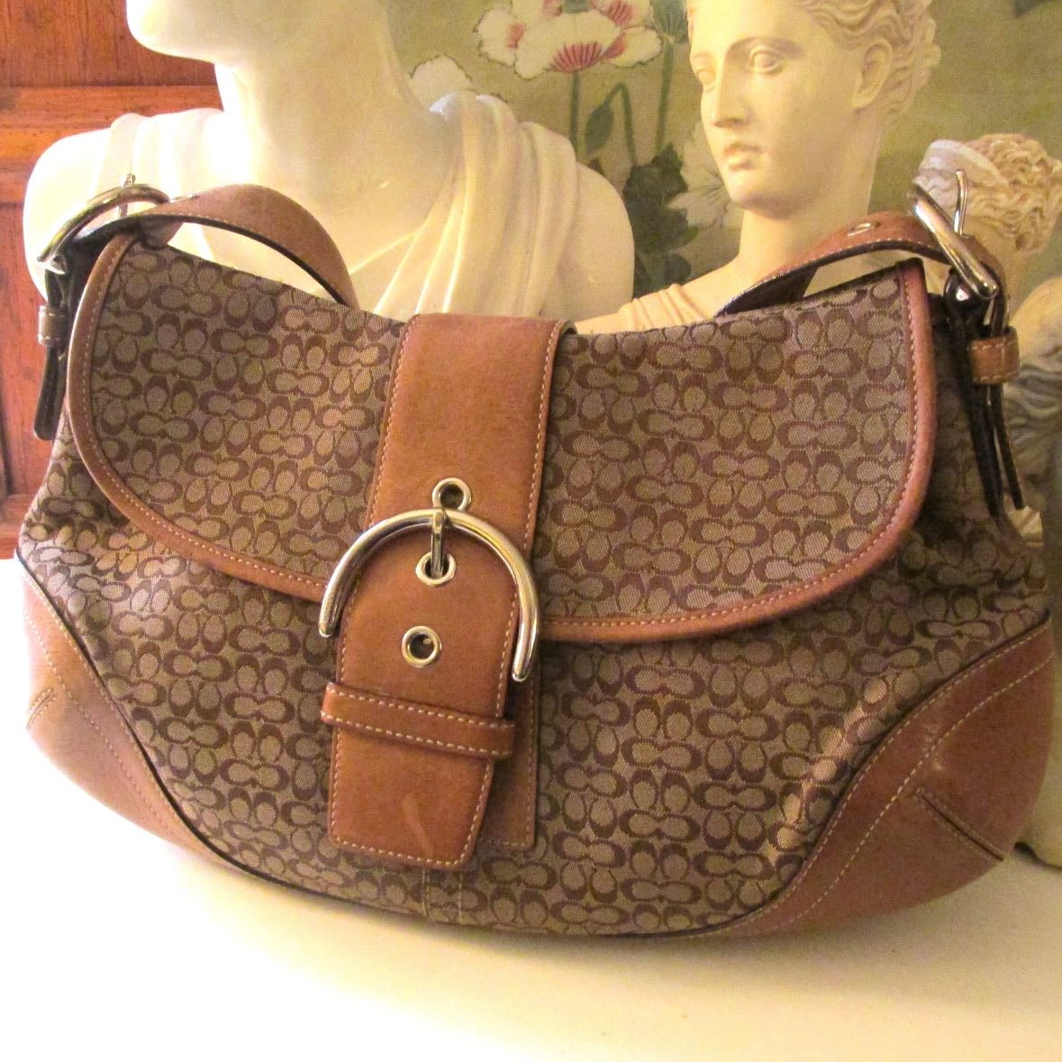 Vintage coach - Seen more and more people use these. CAN elevate the outfit but sometimes I feel like people put it on just cause it’s coach. Overall, not really a personal fav.