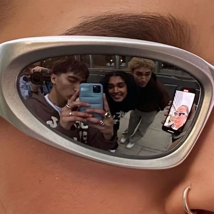 Con el lente de reflejo