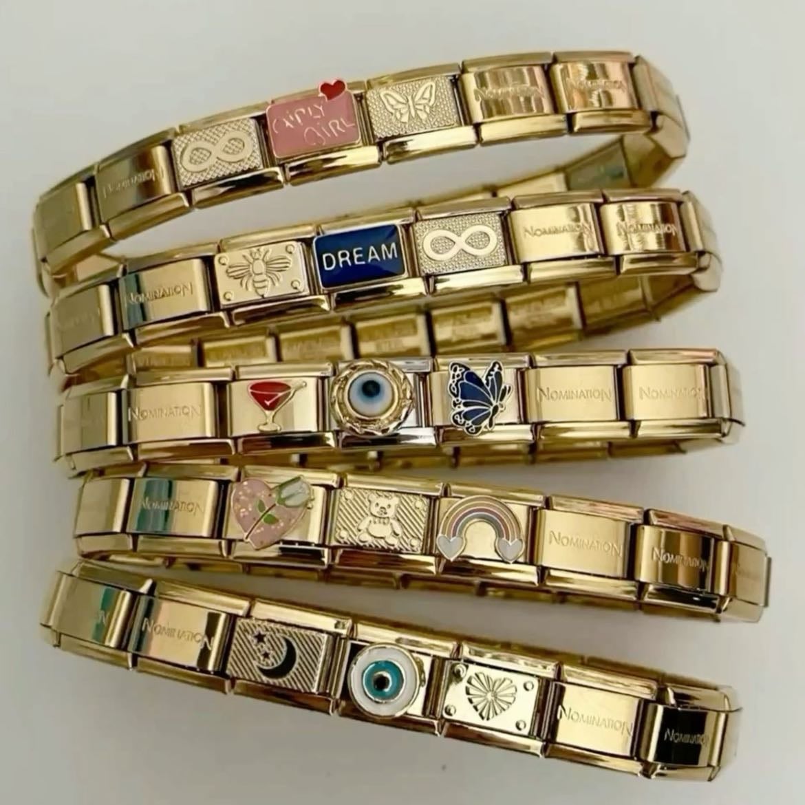 Nomination Bracelet - i alr have a silver one but id love a gold one… or two. you can never have too many