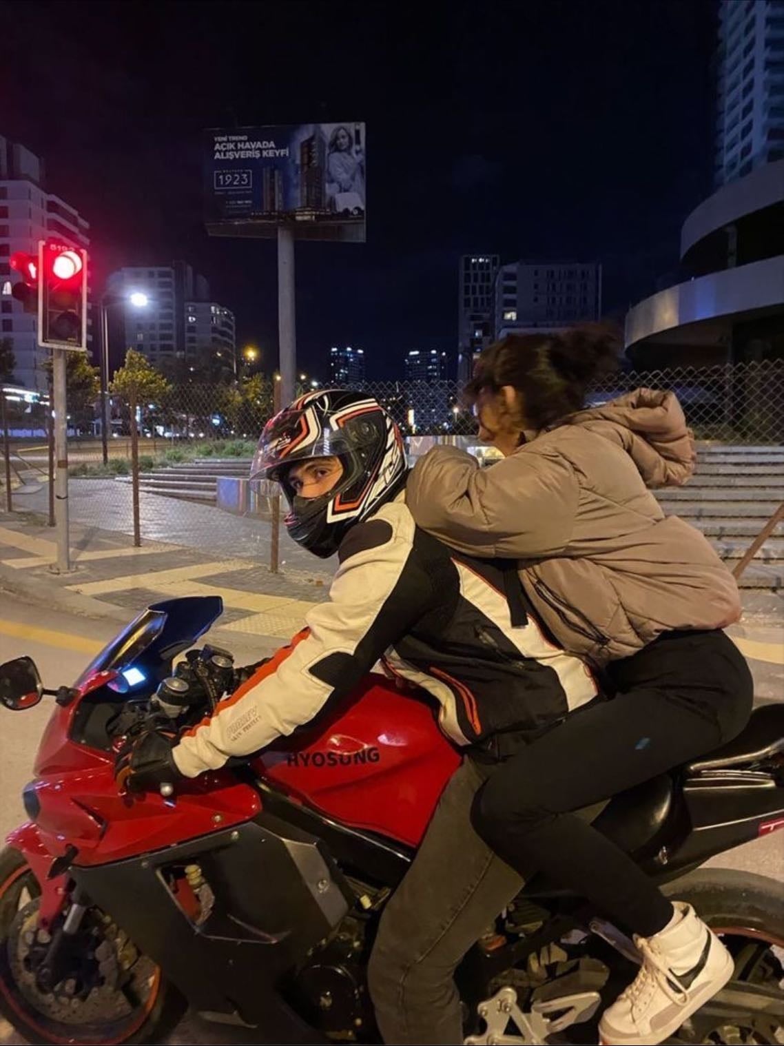 backpacking them on a motorbike