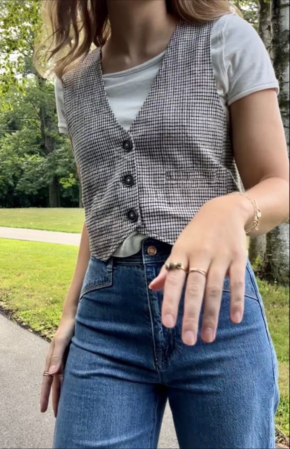 vest, white tee, high-waist denim