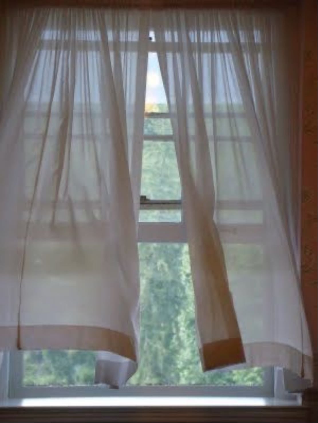 curtains swaying in wind