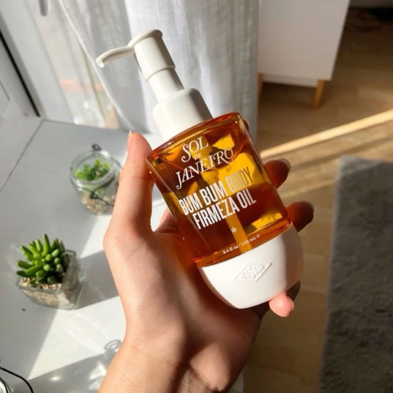 bum bum body firmeza oil sol de janeiro ⭐️