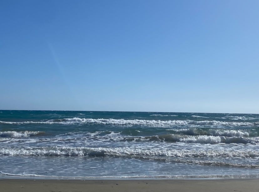 rikkos beach - swimming to the rocks, frappes, tanning, music, bakery food