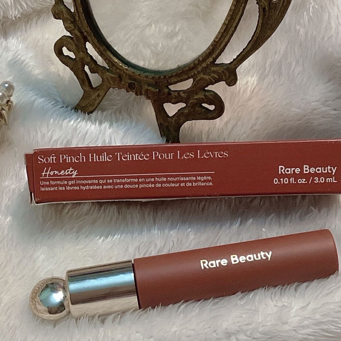RARE BEAUTY lip oil - Delight