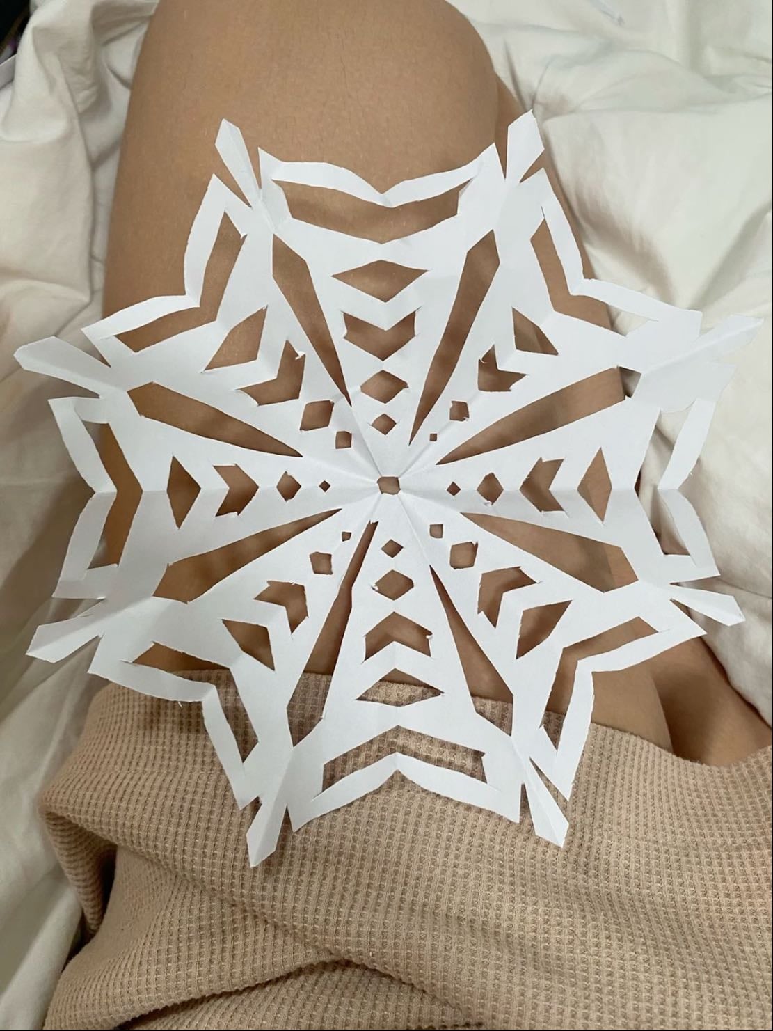 Make paper snowflakes