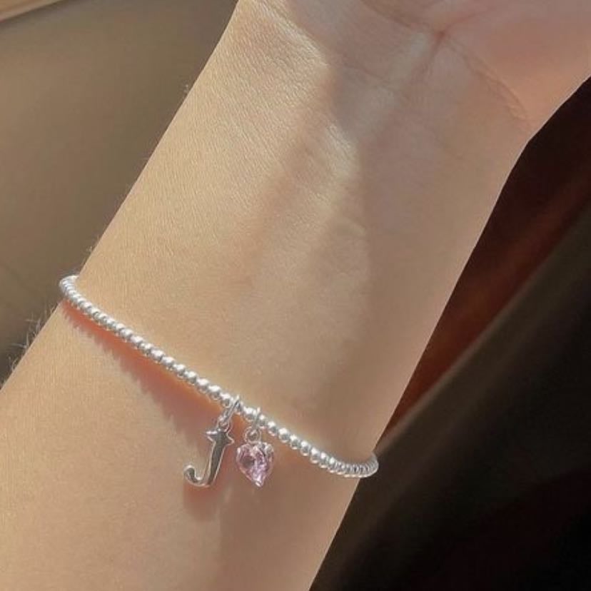 pulserita - con inicial