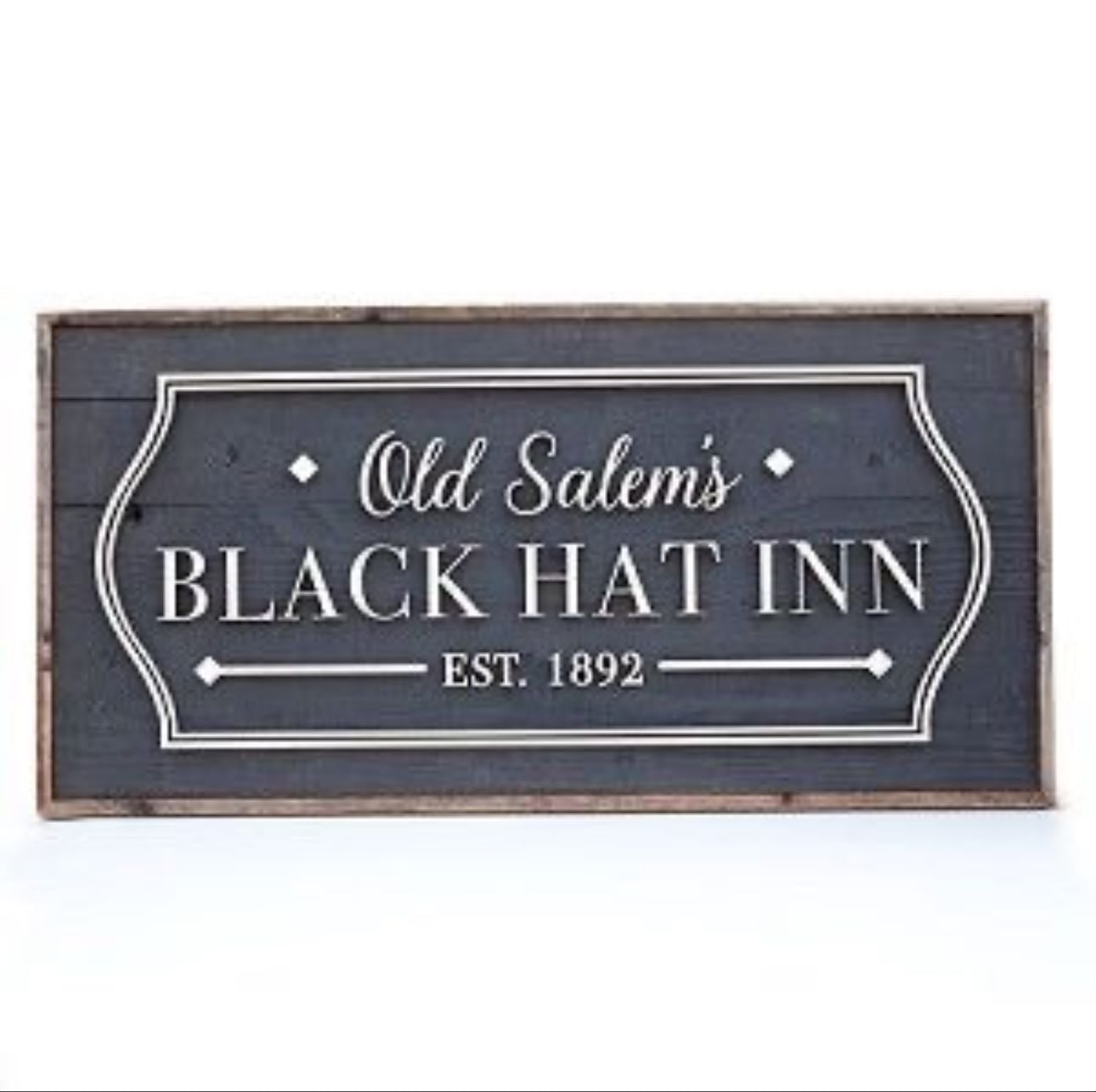 Old Salem’s Black Hat Inn Wall Sign