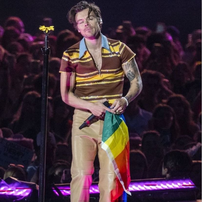 coventry 05/22/2023 - brown and yellow striped quarter-zip shirt with rhinestones and light blue collar, tan pants, brown satellite stompers