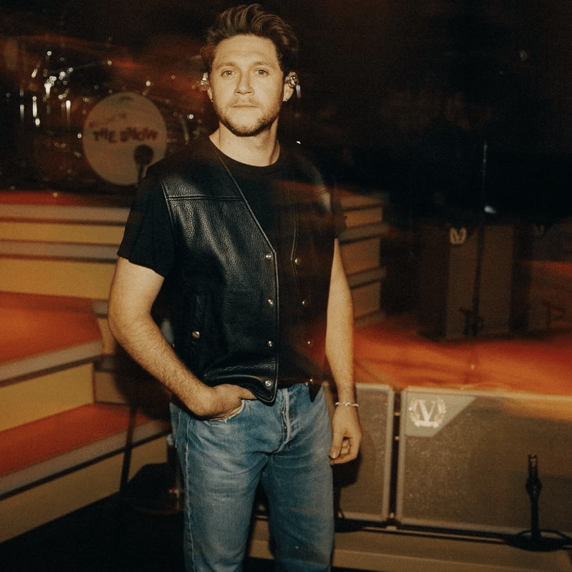 #28 — glasgow - blue jeans, b&w patterned handkerchief, black cropped tee, black leather vest, belt, black converse