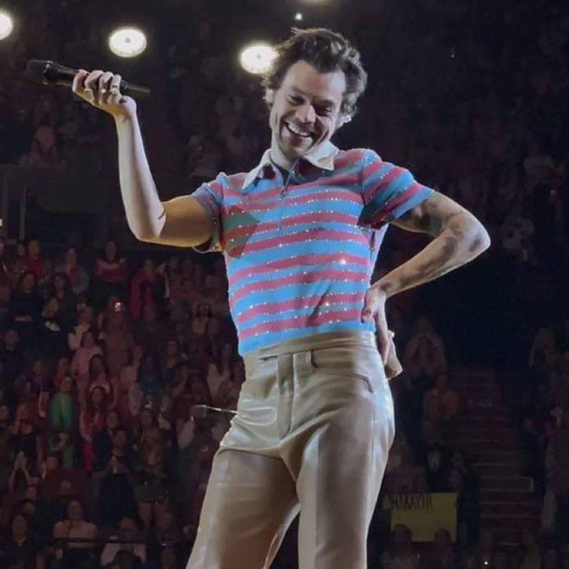 la 11/02/2022 - tan leather pants, red and blue striped cropped polo, blue and white satellite stompers