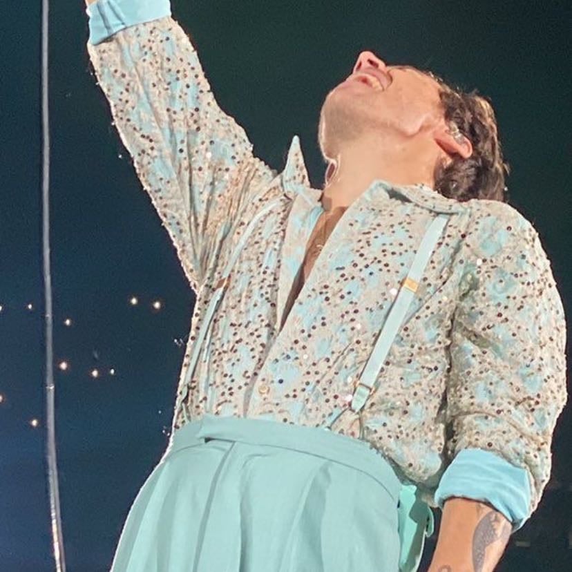 orlando 10/07/2021 - white and teal checkered? pattern sparkly button up, white suspenders, teal pants, white boots