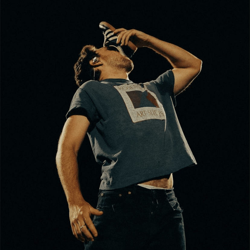 #5 — brisbane - black jeans, RING, grey “Rosenthal Art Slides” cropped shirt, bonus points for the shoey, adidas?