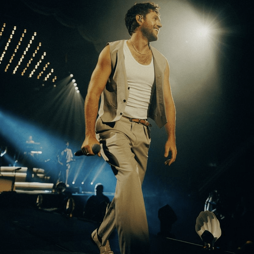 #35 — saint paul - tan pants, tan vest, white tank top, white dress shoes, necklace, brown belt