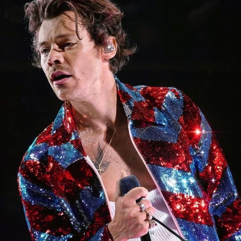 chicago 10/10/2022 - white tank top, blue and red sparkly chevron jacket, blue and red sparkly chevron pants, red satellite stompers