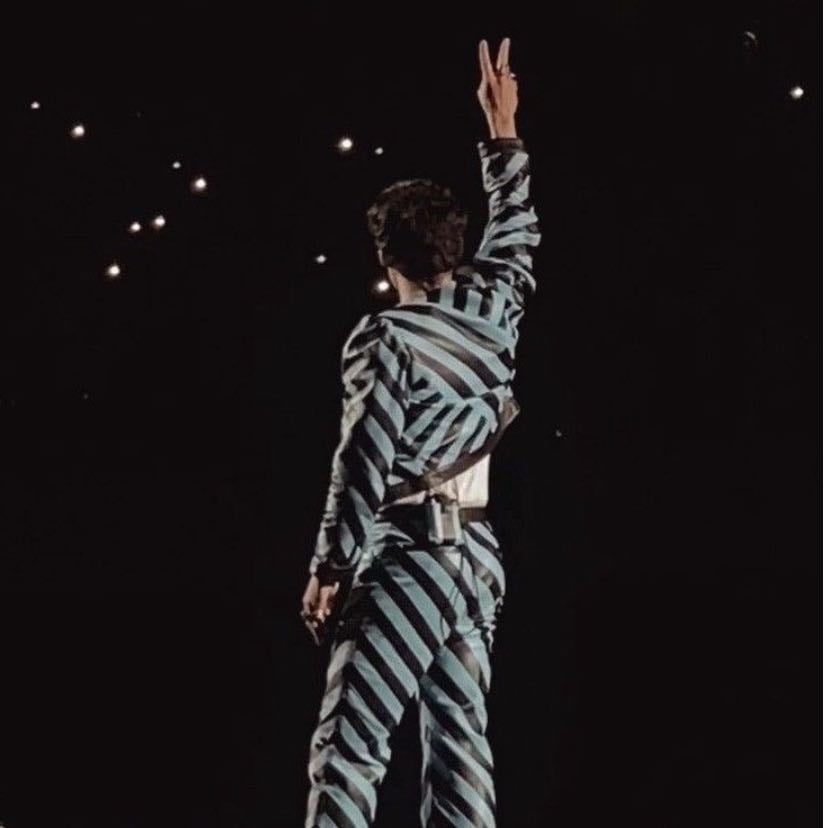 tokyo 03/24/2023 - white tank top, black and blue striped jacket, black and blue striped pants, brown satellite stompers