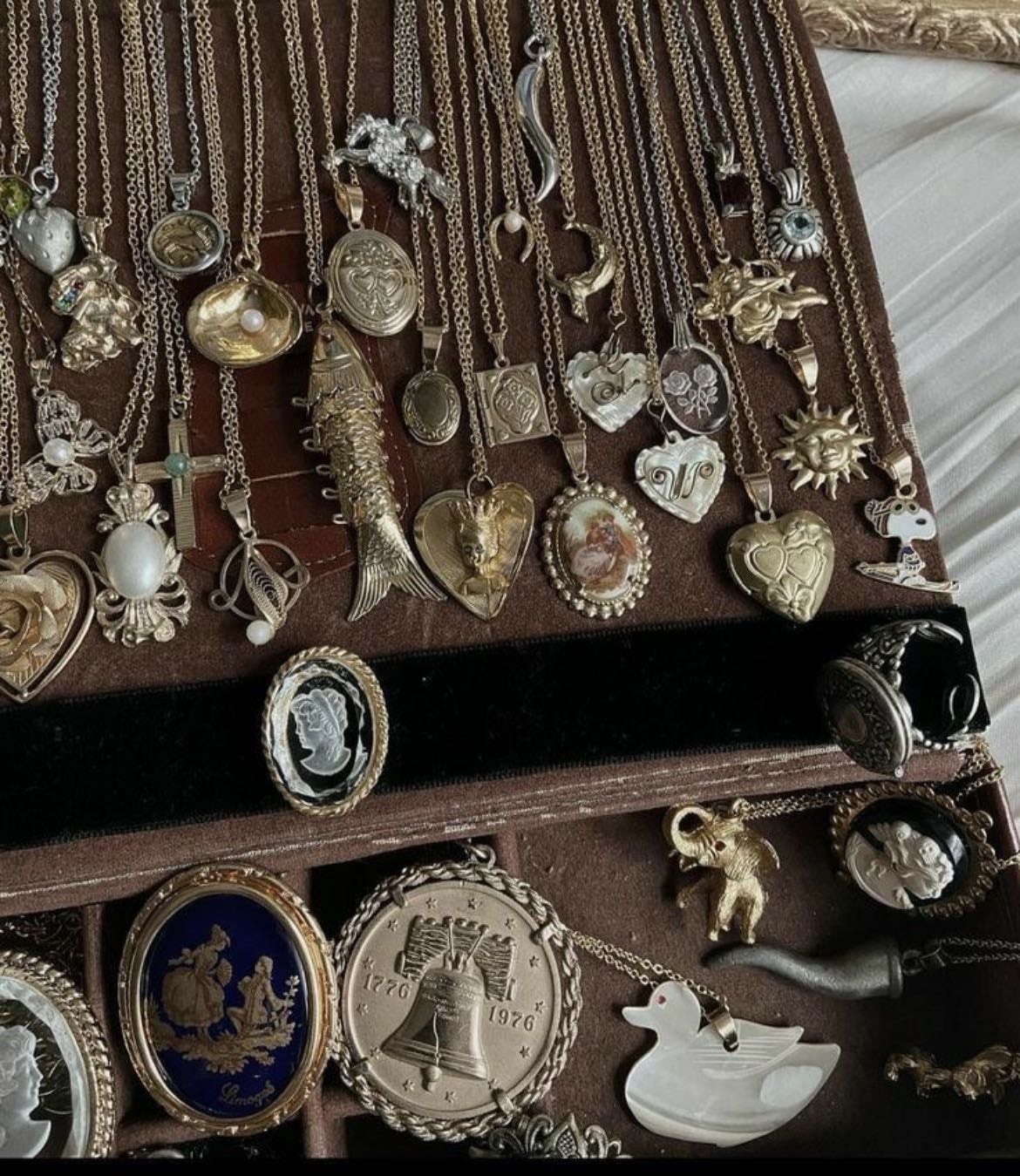 showing off my necklace collection