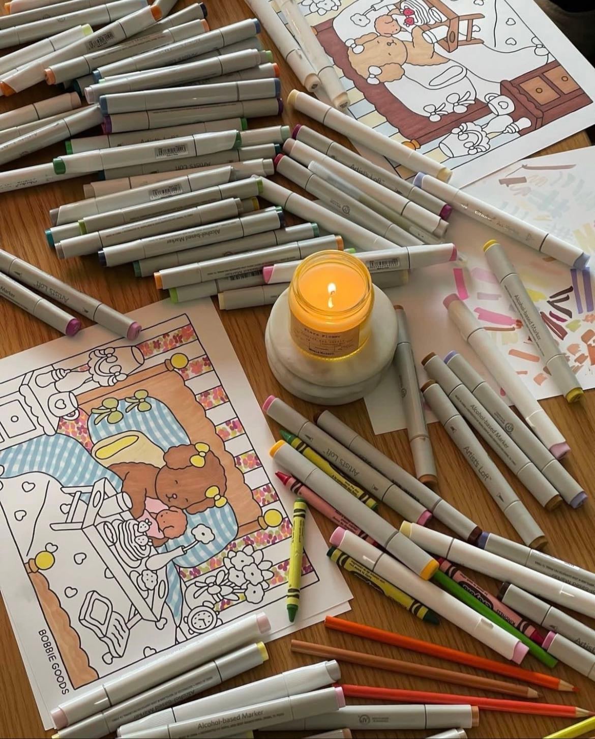 coloring date - buy the same coloring book and some colored pencils to color together at for example an exam while drinking a cozy drink and having a sweet treat