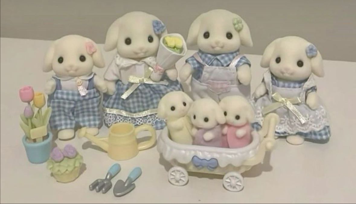 gardening white bunny family