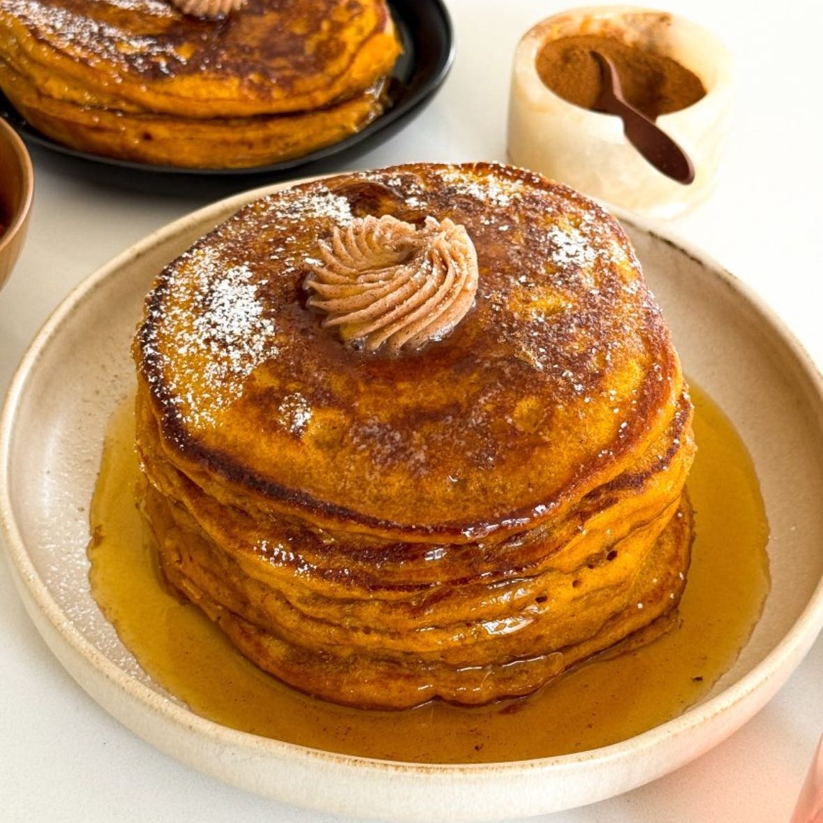 Pumpkin pancakes with cinnamon butter