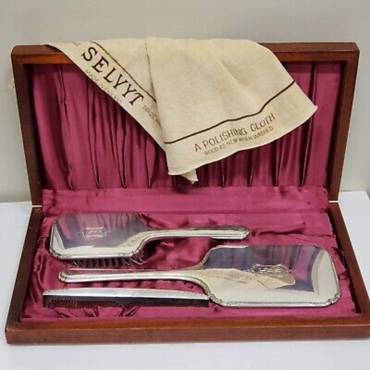 Vintage hand mirror and brush set