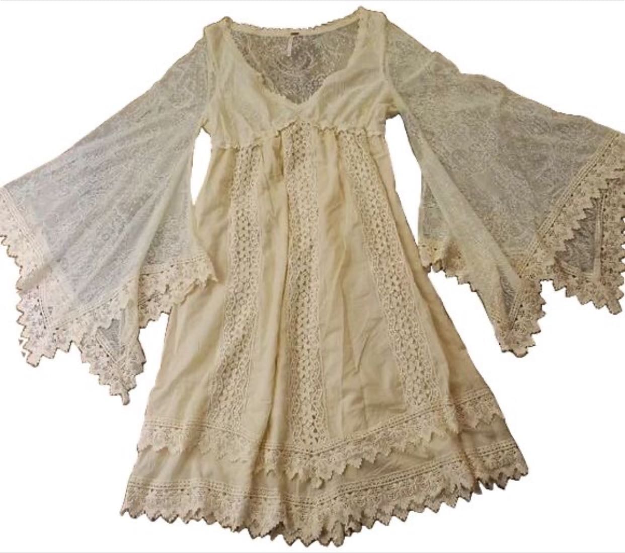 white long flared sleeve dress