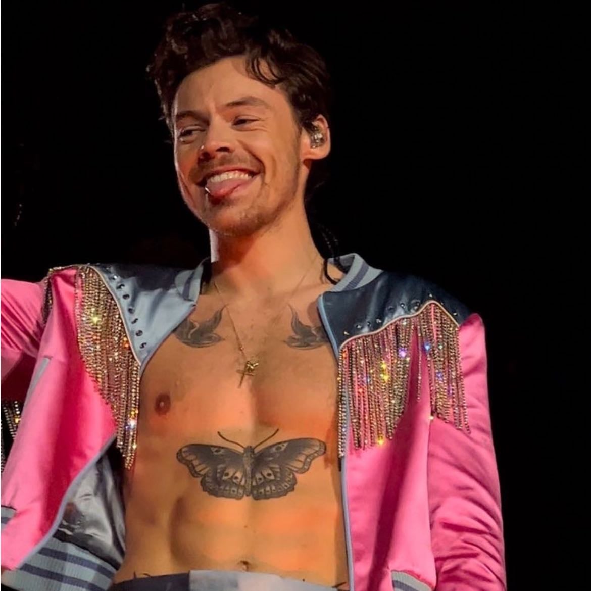 la 01/29/2023 - Metallic light blue loose pants, no shirt, pink and blue metallic vest with sliver tinsels, pink satellite stompers