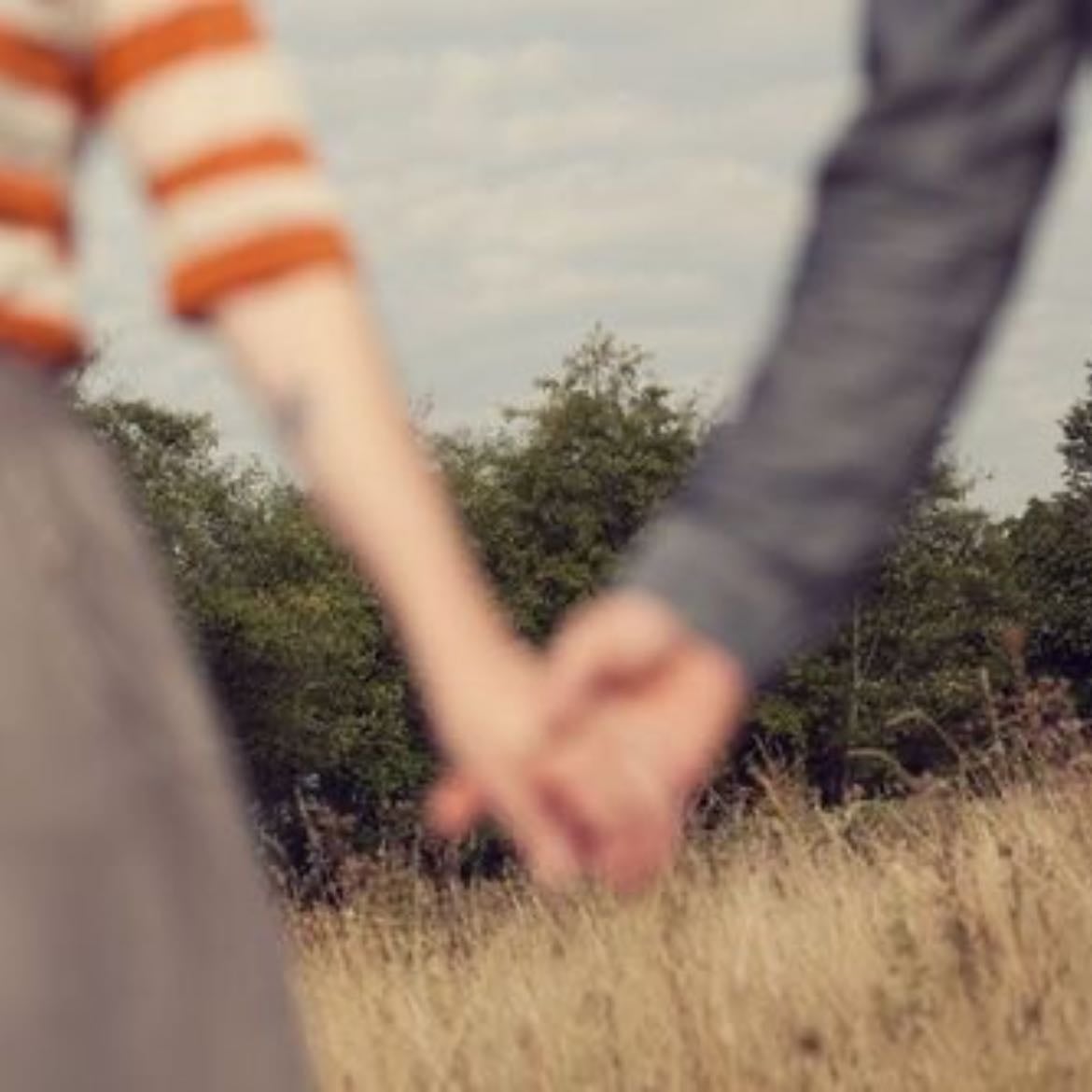 holding hands - the act of being hand in hand with someone you love