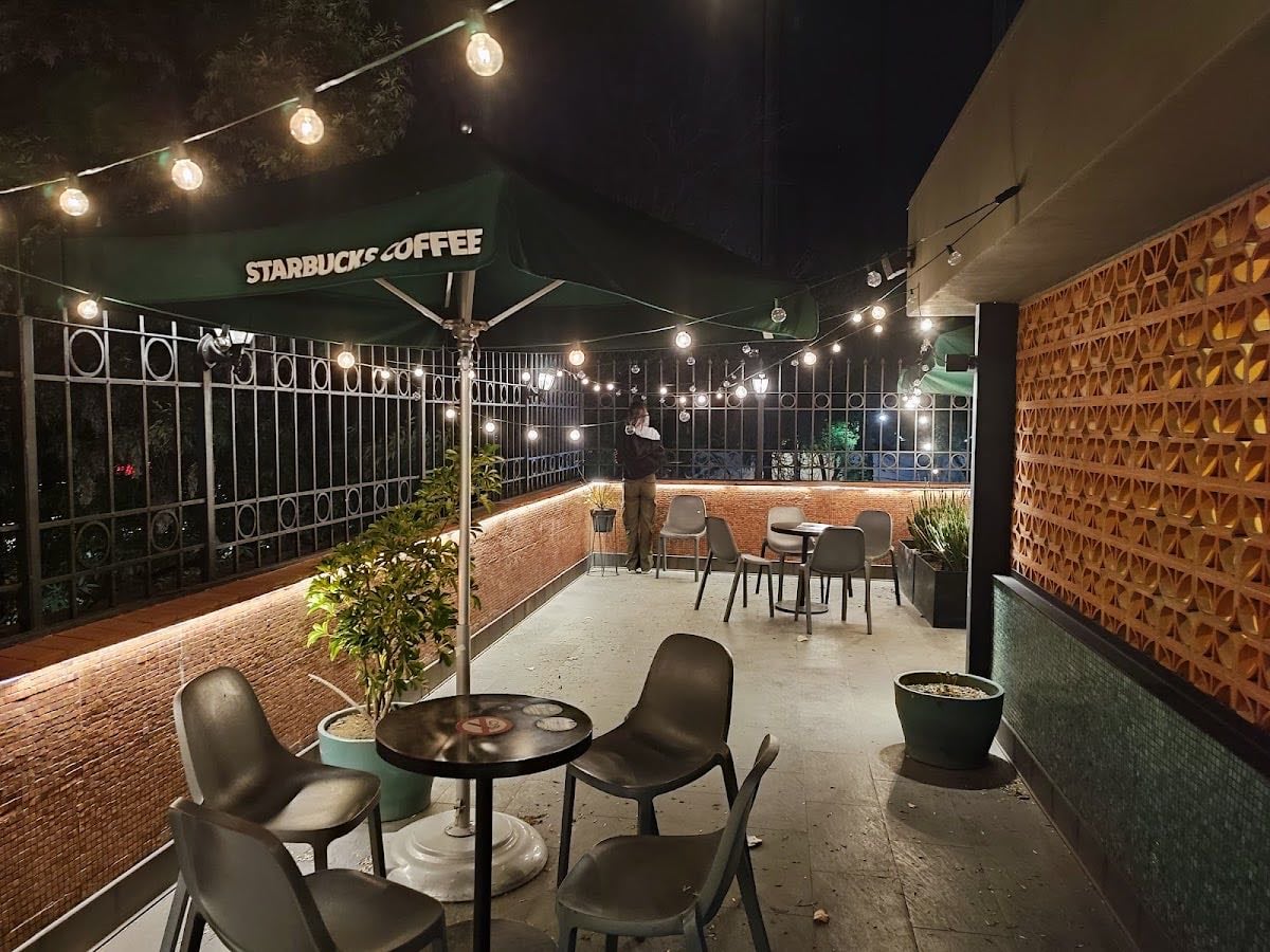 Starbucks • Masaryk Spencer