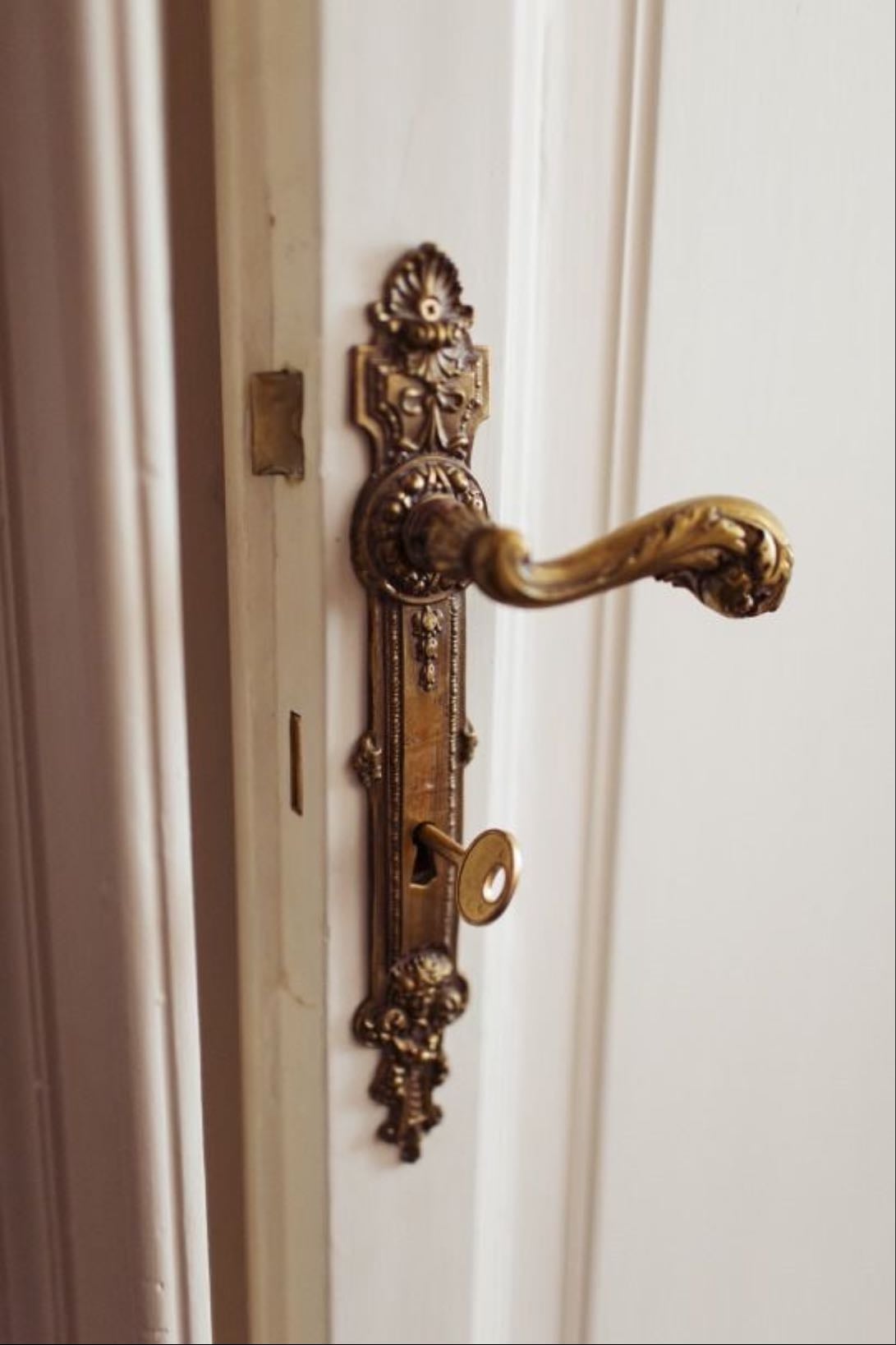 Intricate wooden doorknobs - & knockers