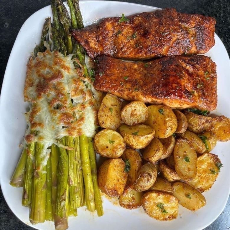 Golden salmon with delicious sides