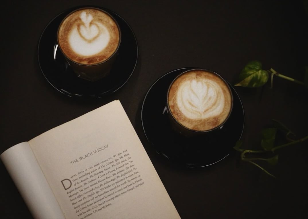 Coffee and book - Coffee and a book at a bookshop cafΓ©