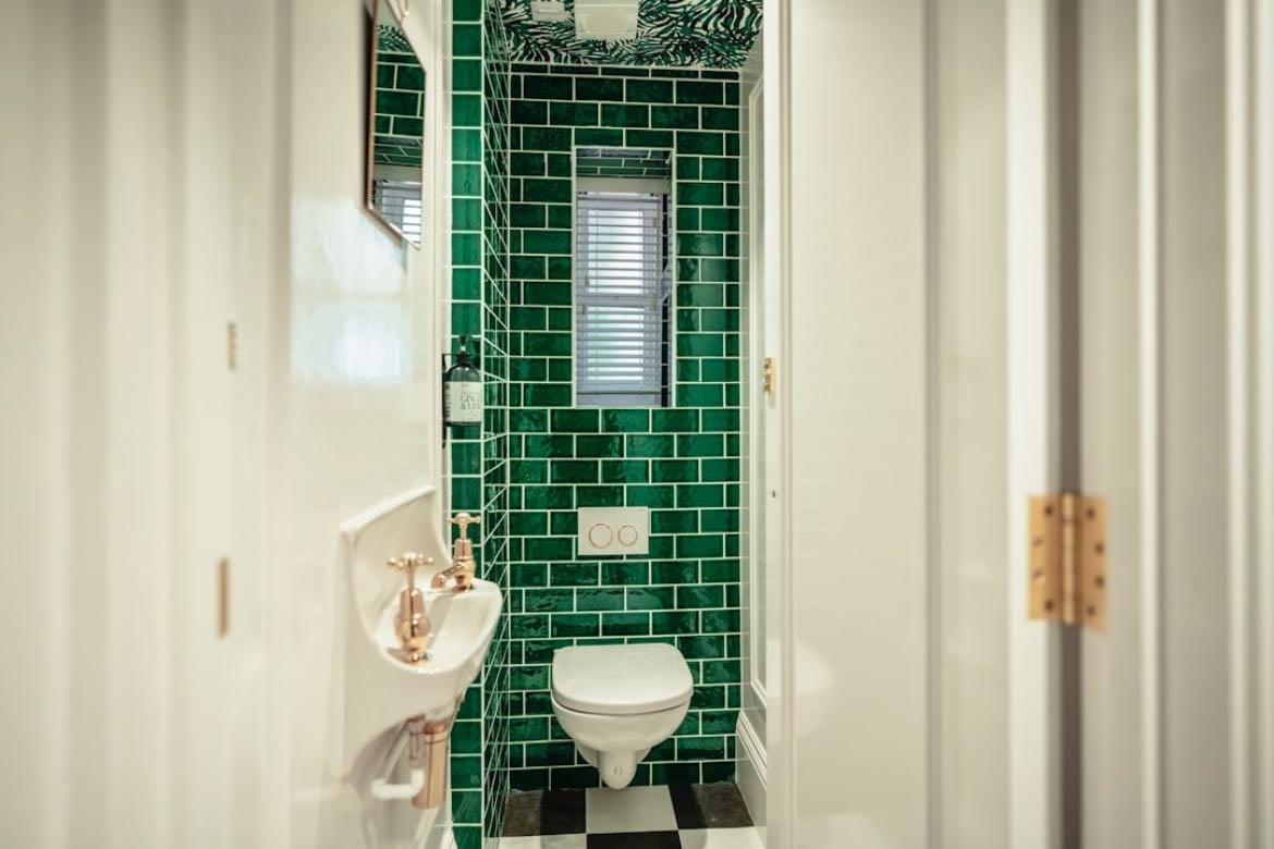 Green tiled shower