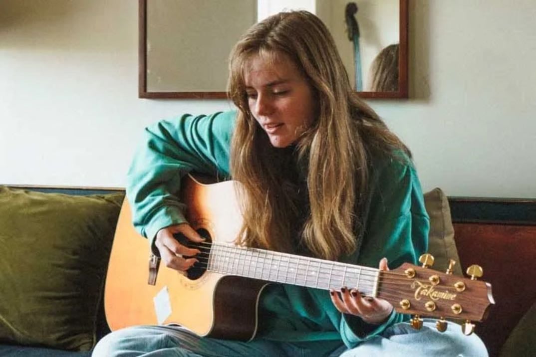 Playing guitar