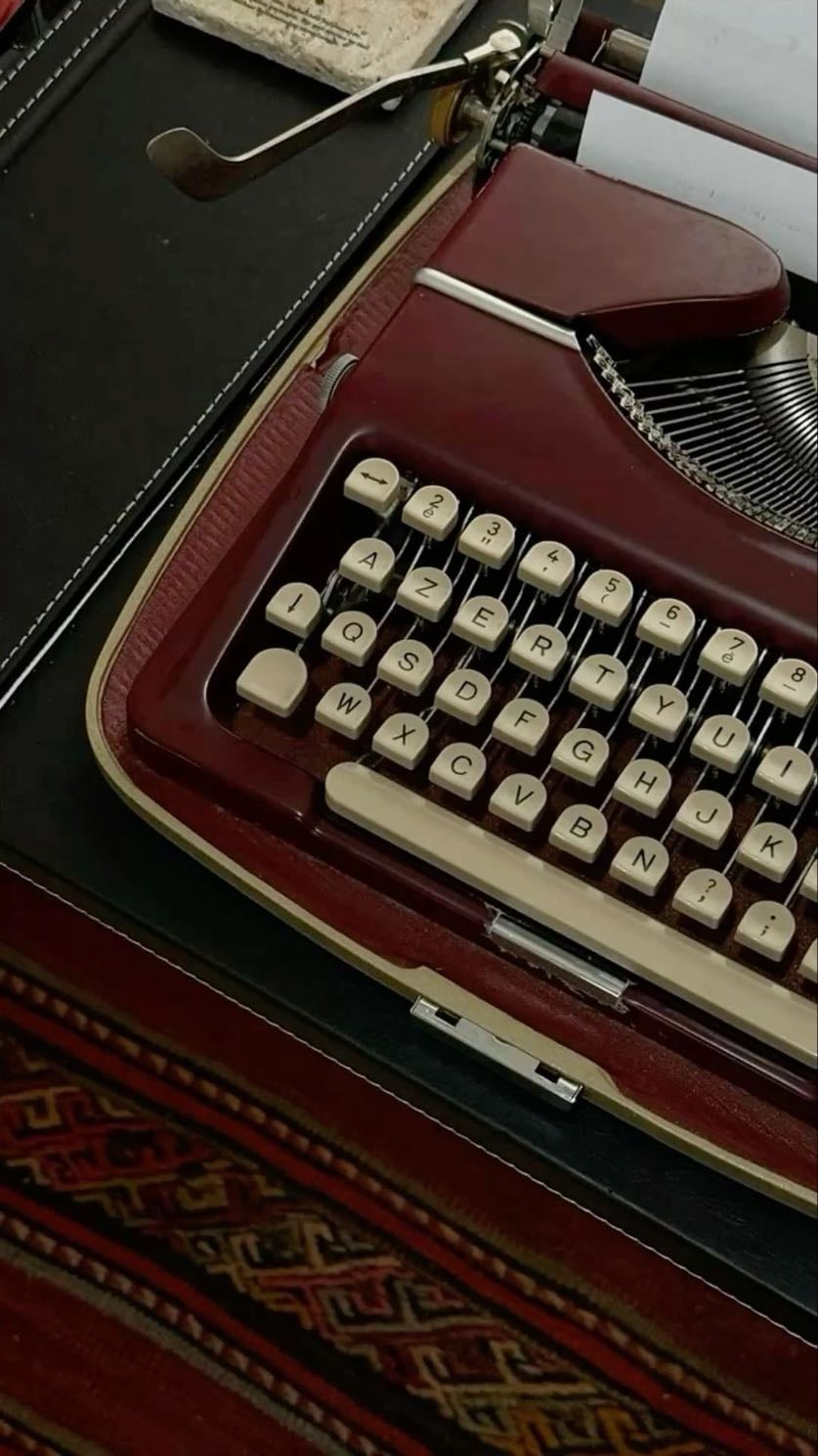 Burgundy tipewriter