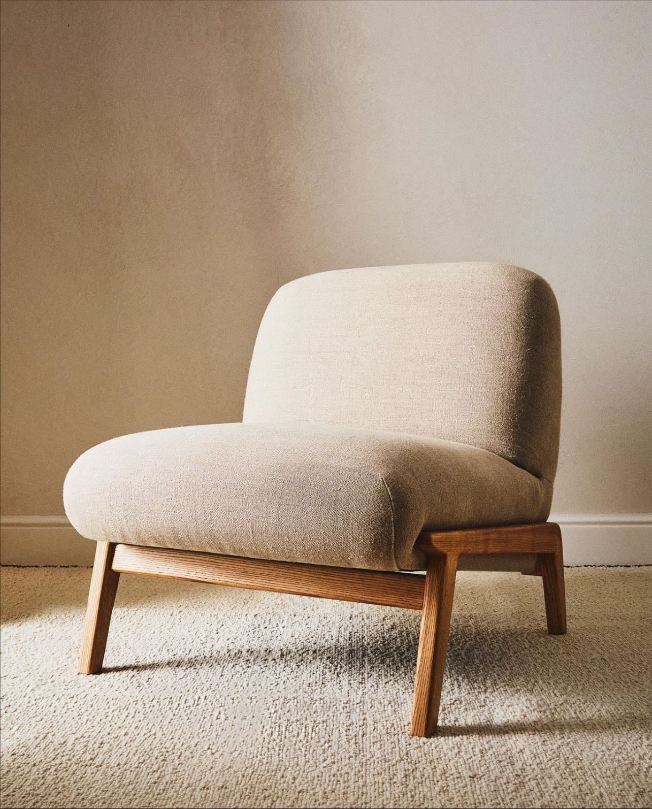 a single sofa chair that isn't the same color as the couch, but matches it perfectly