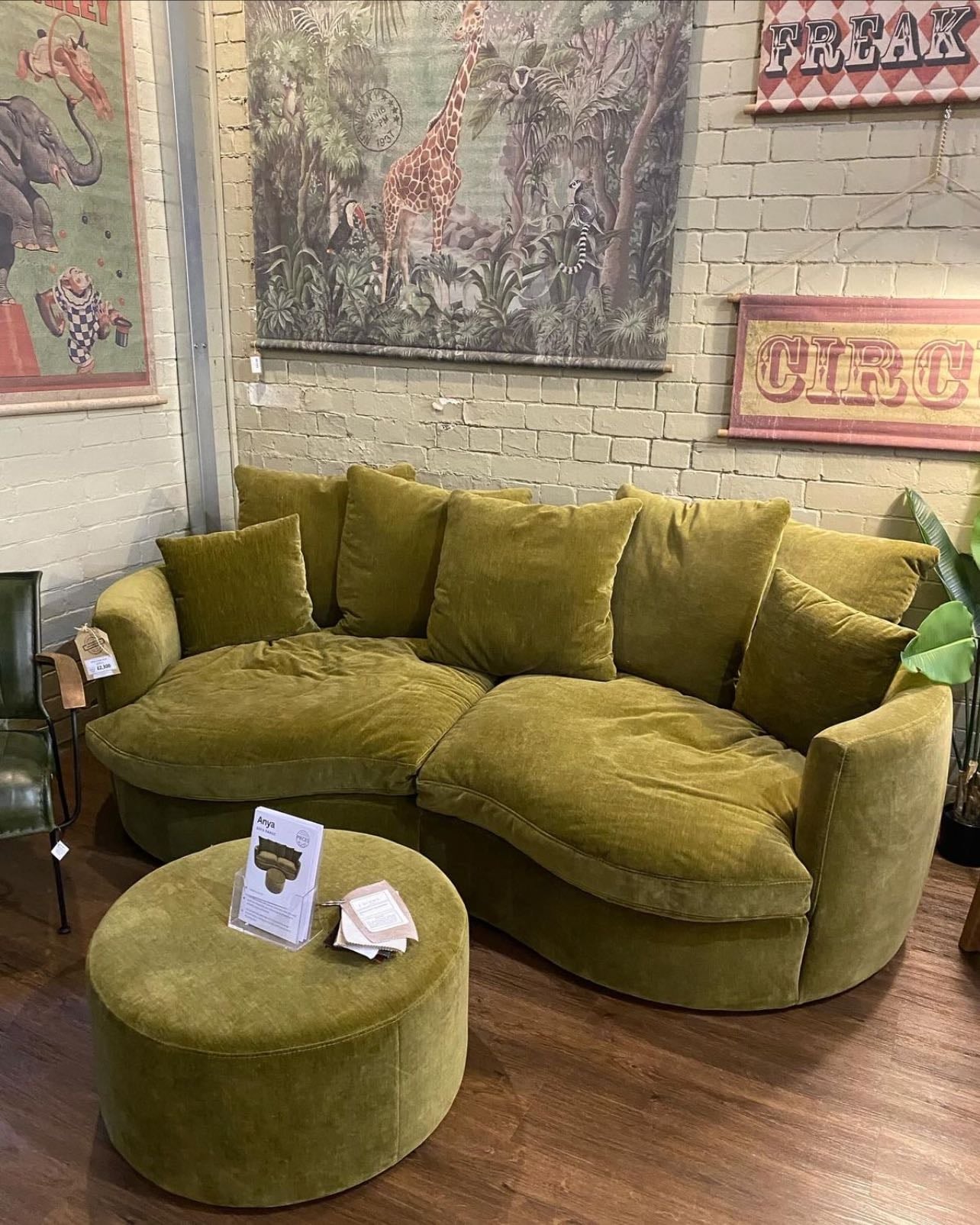 a couch that gives the room a pop of color