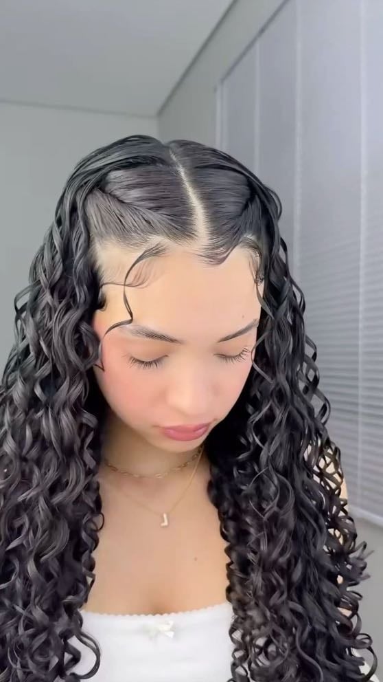 Sleek middle part with side twists