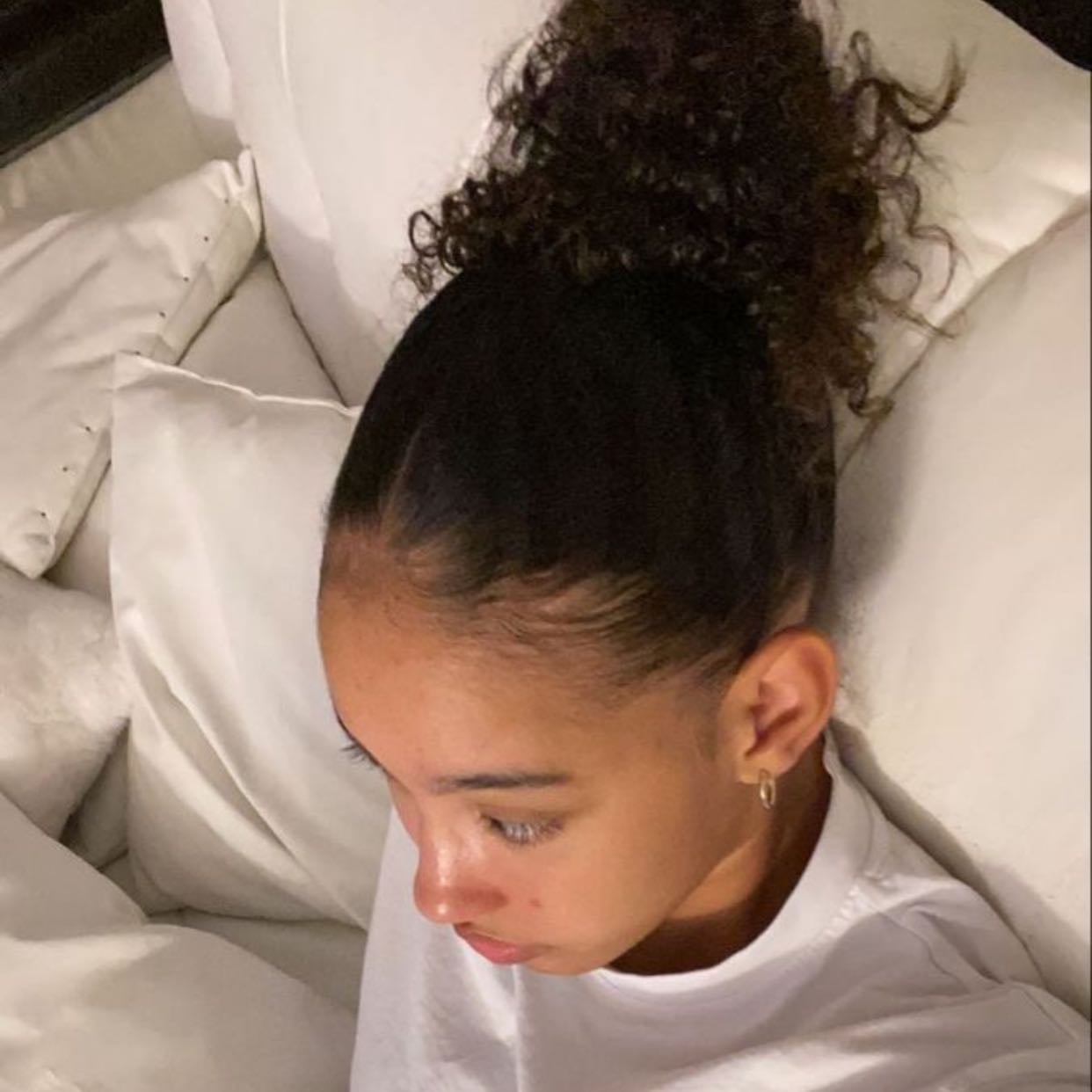 slick bun messy curls