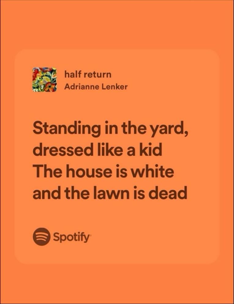 adrienne lenker - standing in the yard, dressed like a kid. The house is white and the lawn is dead.