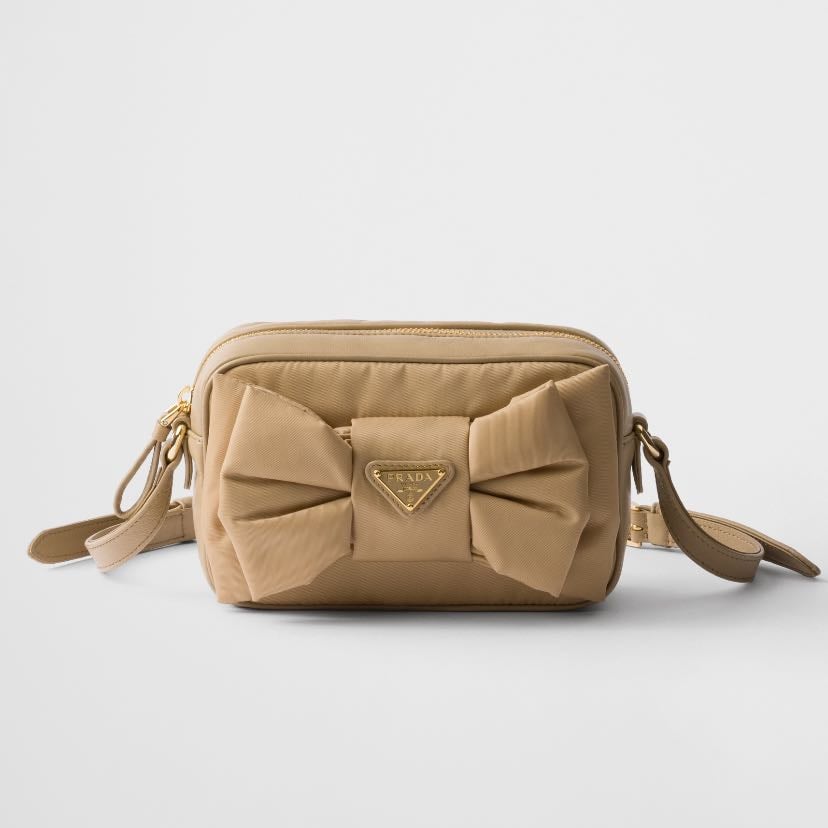 Re-Nylon and nappa leather mini shoulder bag with bow - 1’490 $
