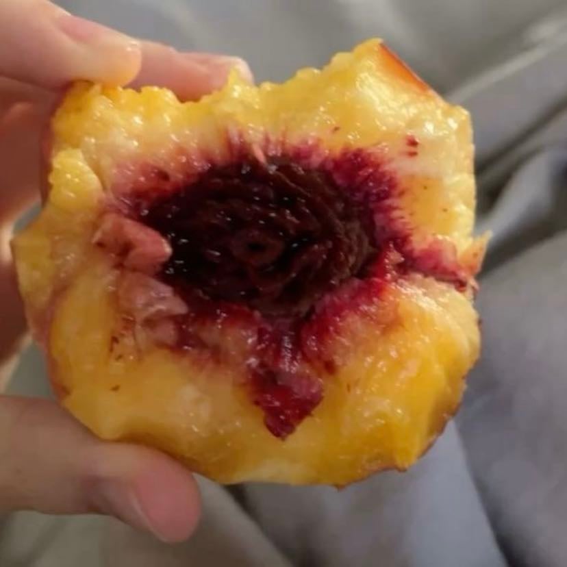 fruit - a perfectly ripe peach that leaves juice on your fingers no matter how careful you are