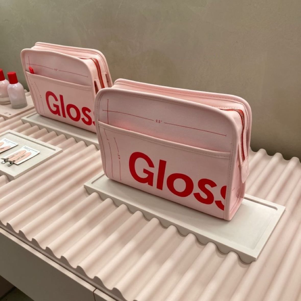 pink glossier makeup bag