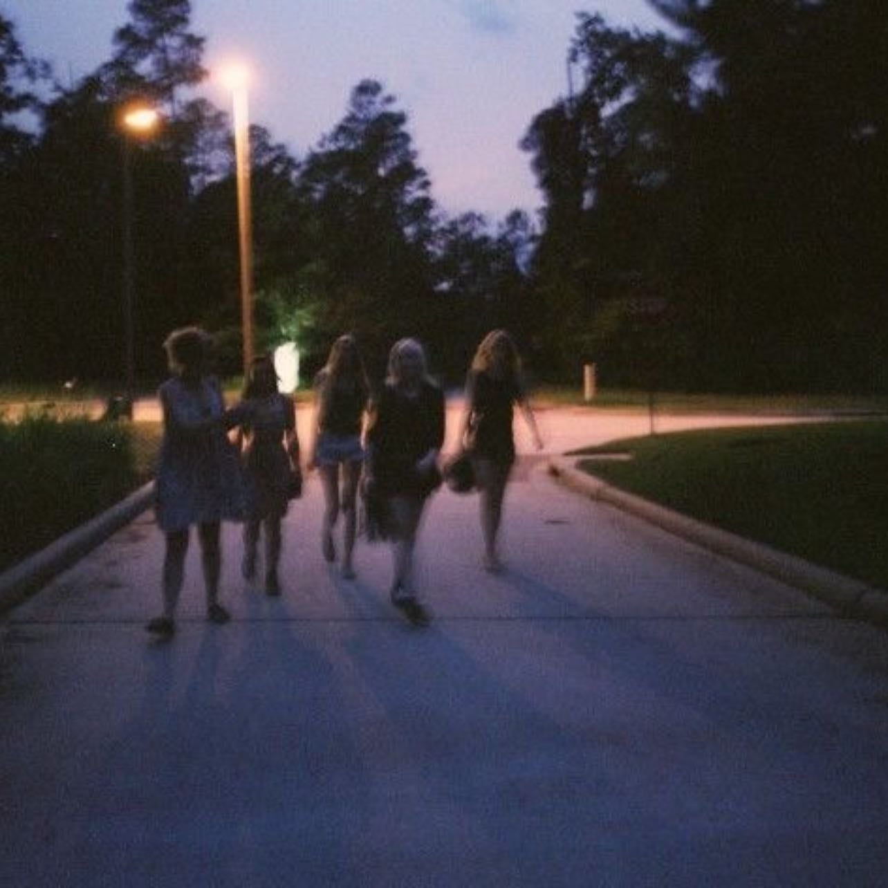 walking with a group of people in a neighborhood after dark - the air is hitting the back of your throat as you laugh into the night sky.