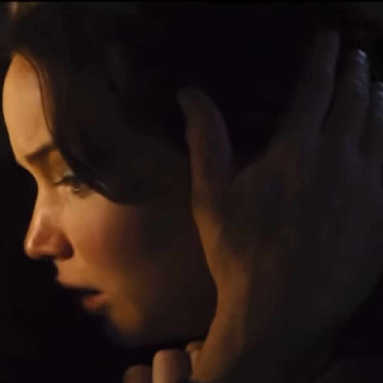 haymitch holding katniss in his arms. - the hunger games: catching fire (2013)