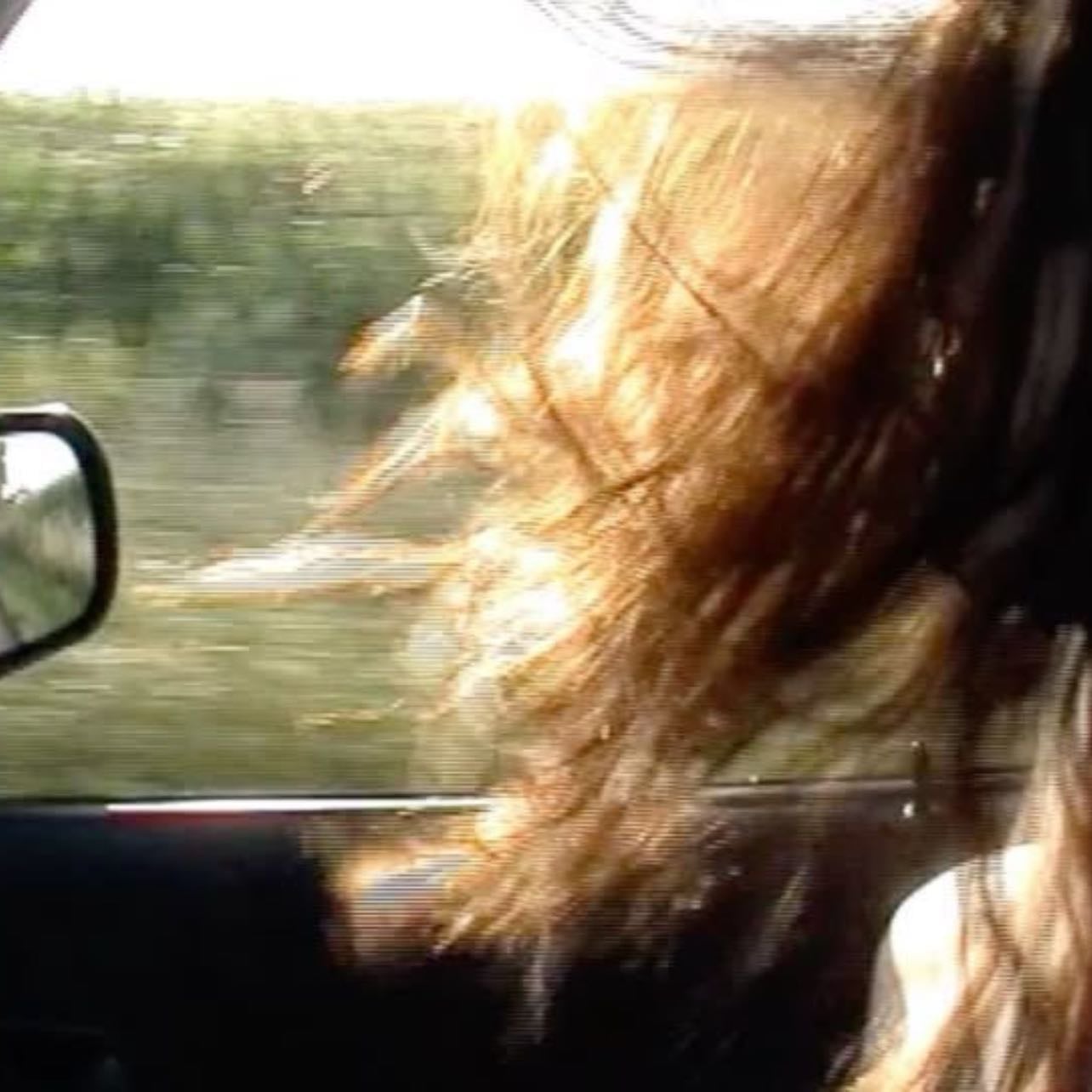 the wind blowing through your hair on a long car ride - bonus points if a good song is playing in the background.