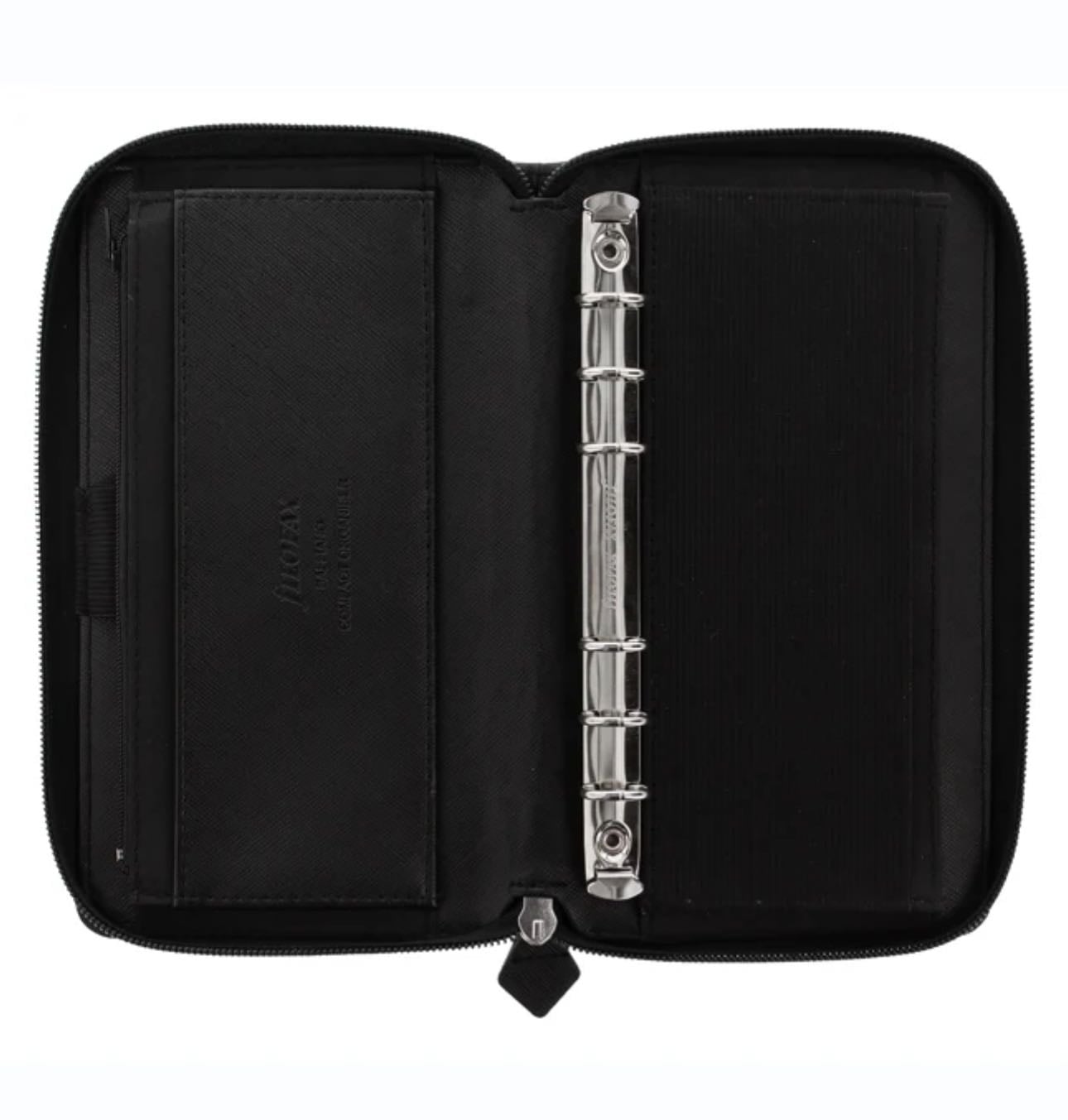 filofax zip organiser - so cute. i use it like planner & wallet, so useful when you're constantly carrying around five hundred little pieces of paper and cards. also i like my journals decorated.